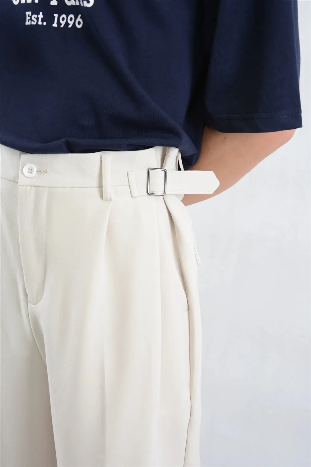 Wide Leg Pleated Trousers with Buckle Detail